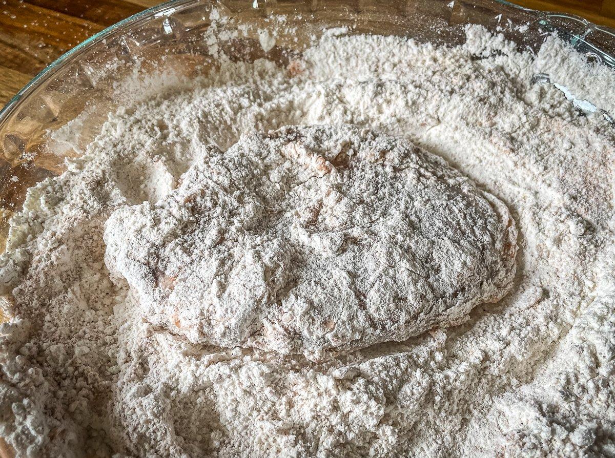 Pound the goose breasts with a meat mallet and dredge in the flour mixture.