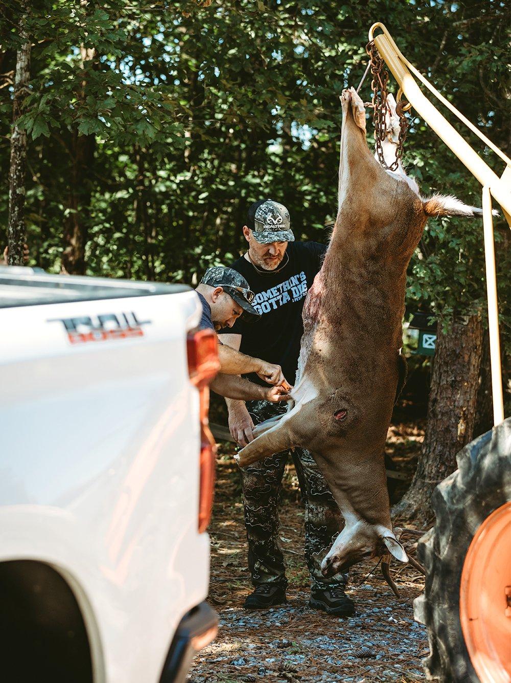 Having a gambrel to hang your deer from makes the task of skinning and quartering much faster and easier on your back. Image by Kerry Wix.
