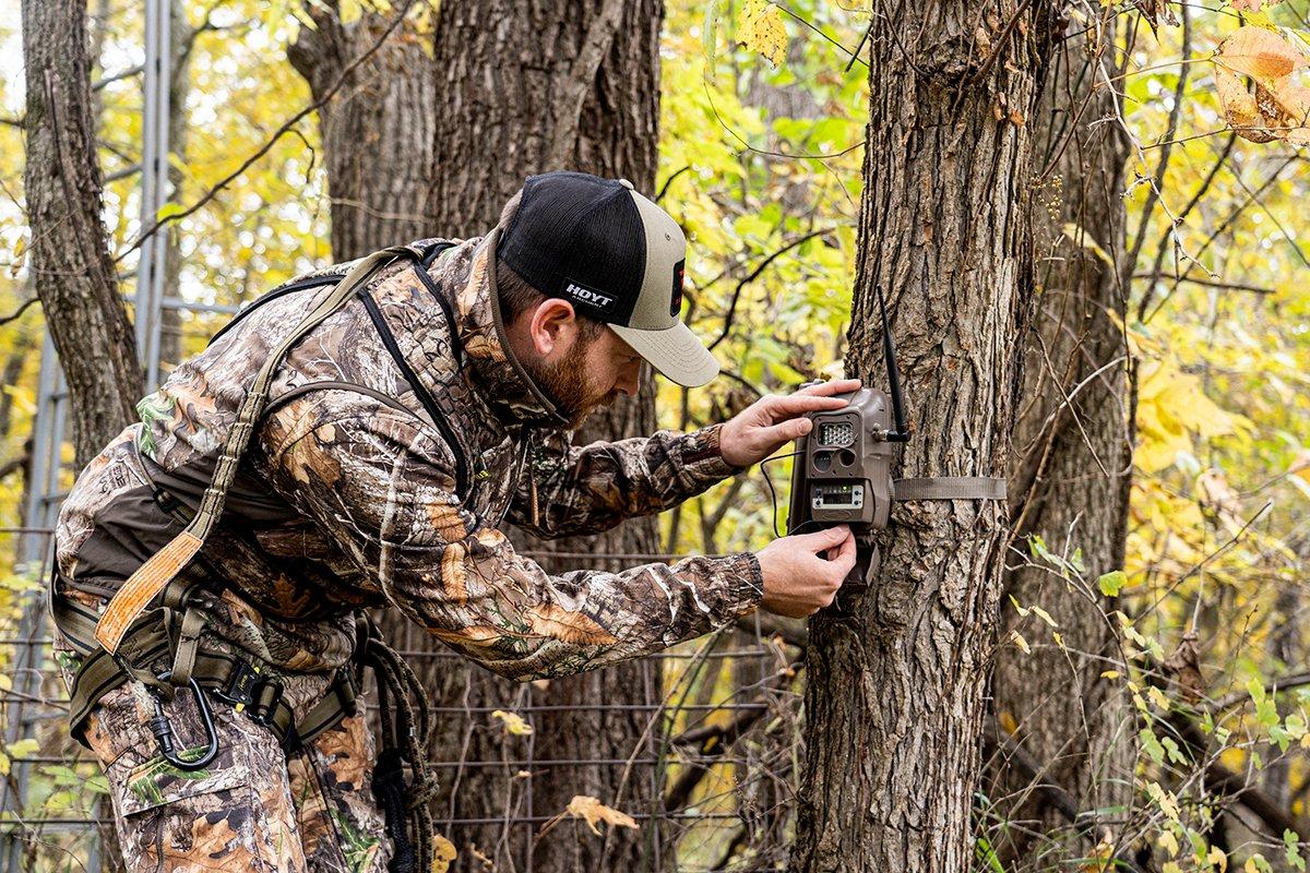 Hang cameras in locations that have multiple features that connect at a common point. It could be a scrape on a field edge, or it could be a trail intersection. Image by Realtree 365