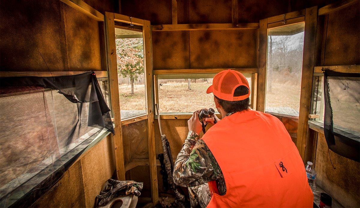 A bottom with a creek or river winding through it is an excellent rut spot. Image by Realtree Media