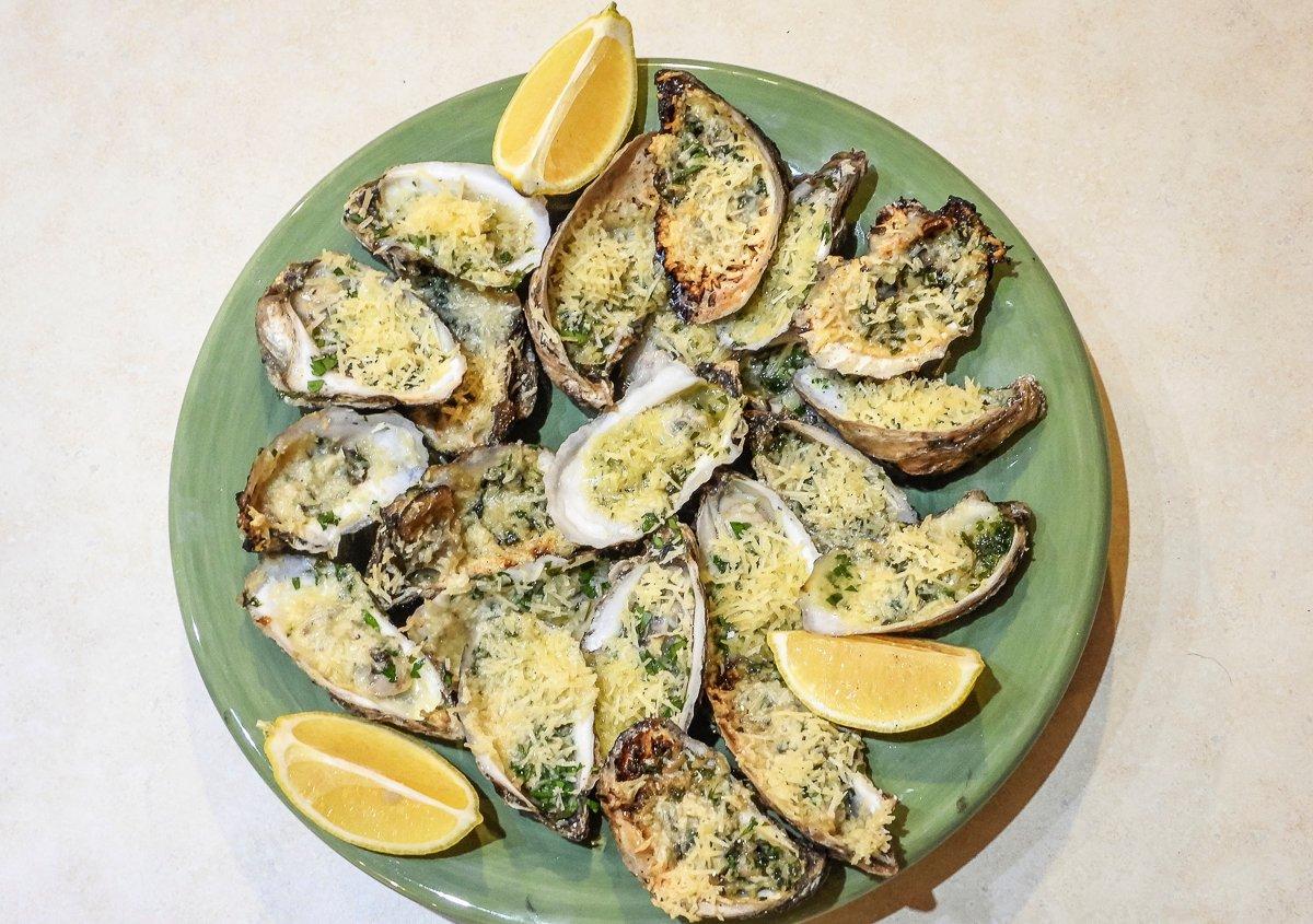 Serve with lemon wedges and hot sauce, if desired.