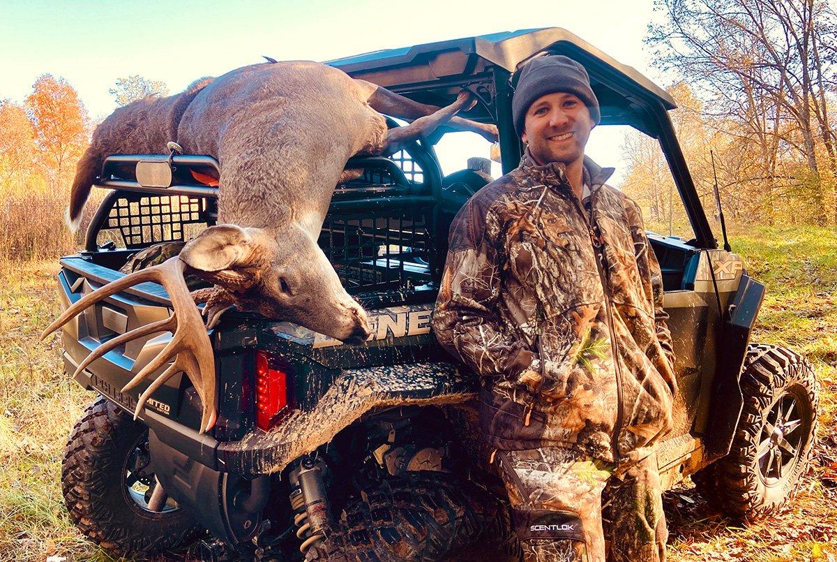 The author with a buck he called in with a grunt call in Tennessee. Image by Will Brantley