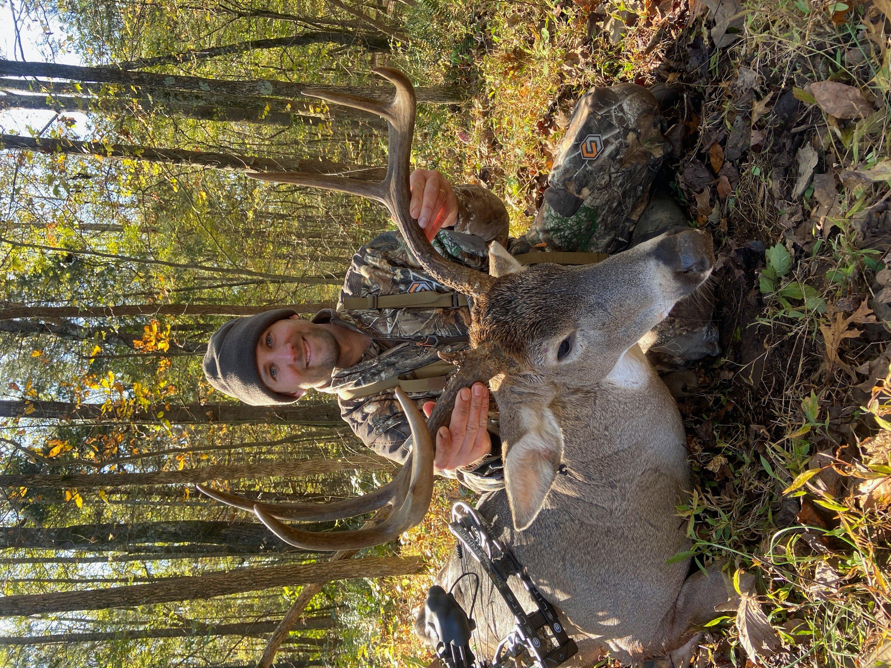 The author with a Tennessee buck, taken after a clean pass-through with a 28-inch, 60-pound bow. Image by Michelle Brantley