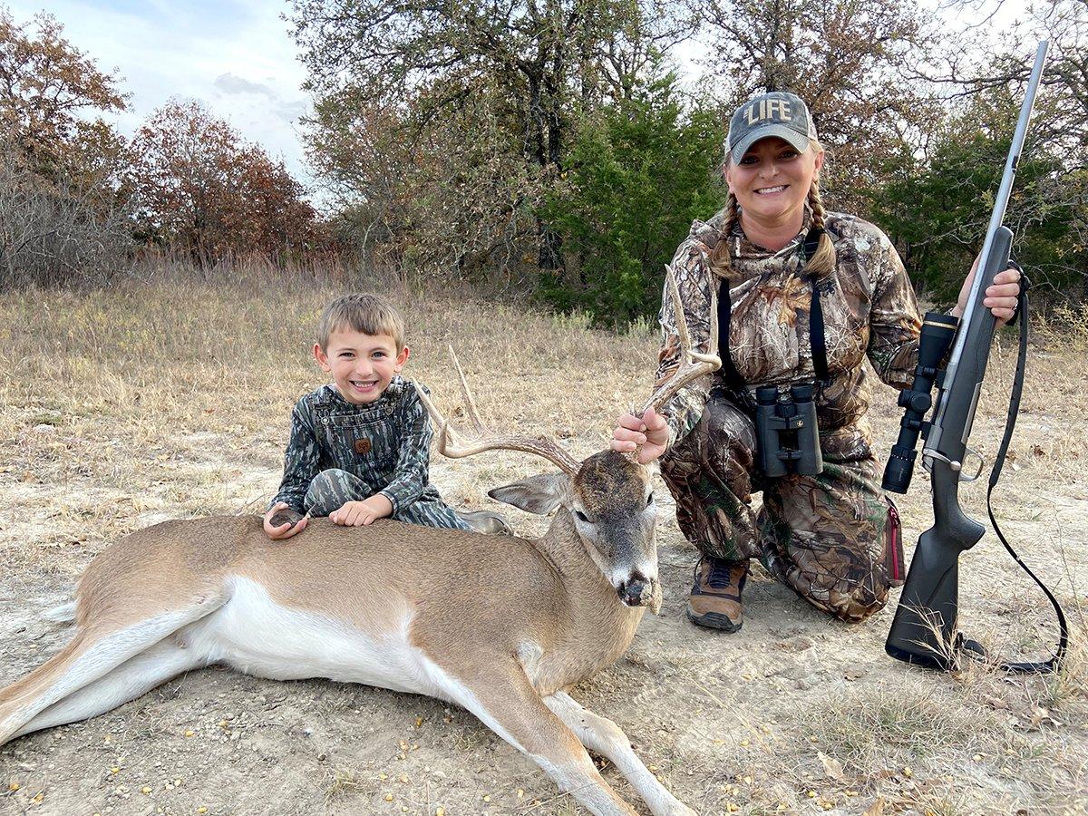 Michelle Brantley and son Anse show off a Texas 8-pointer. Image by Will Brantley
