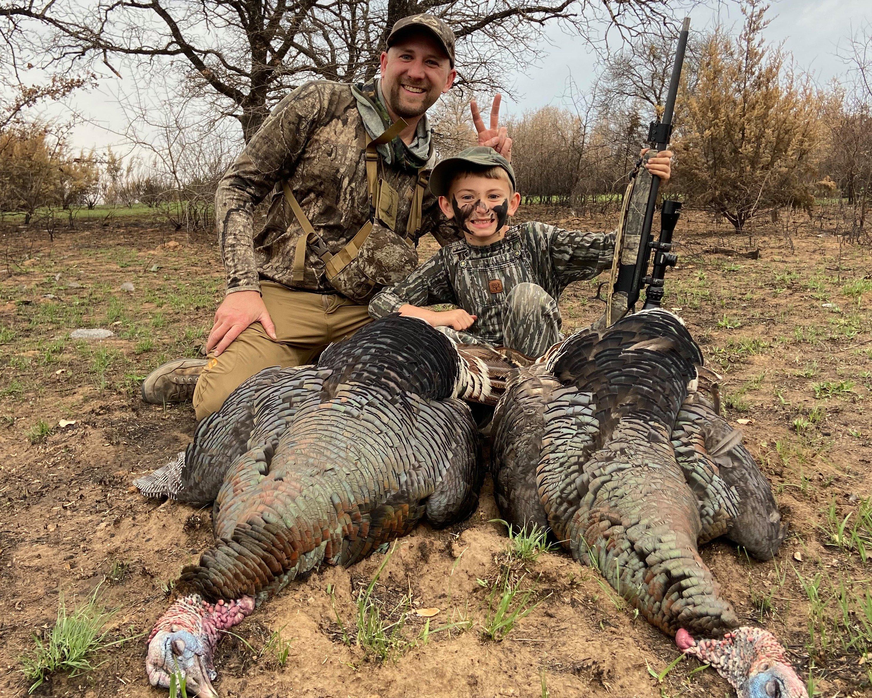 The author and his son, Anse, with a pair of Texas Rios Anse shot with the .410 Scout. 