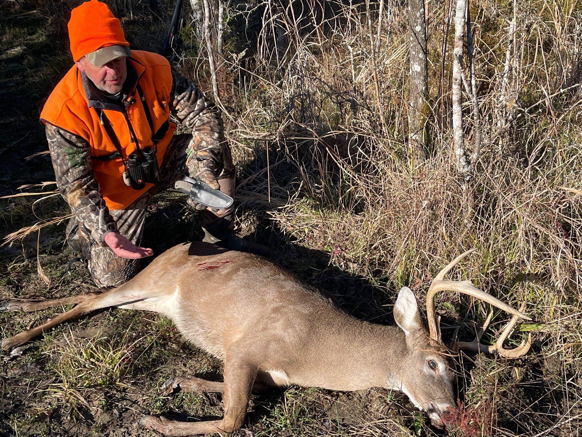 The author with a hard-earned Alabama buck. 