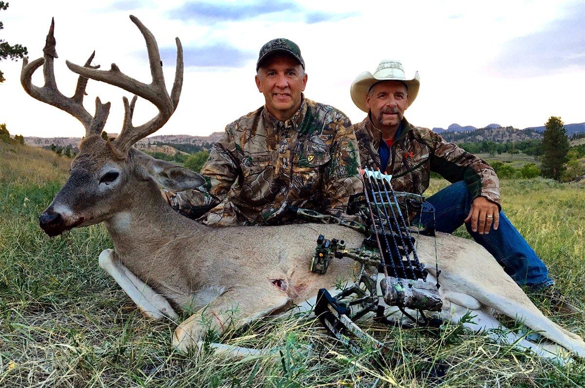 David Blanton and 7J Outfitter's Jeff Smith are all smiles after tagging this velvet buck. Image by Realtree