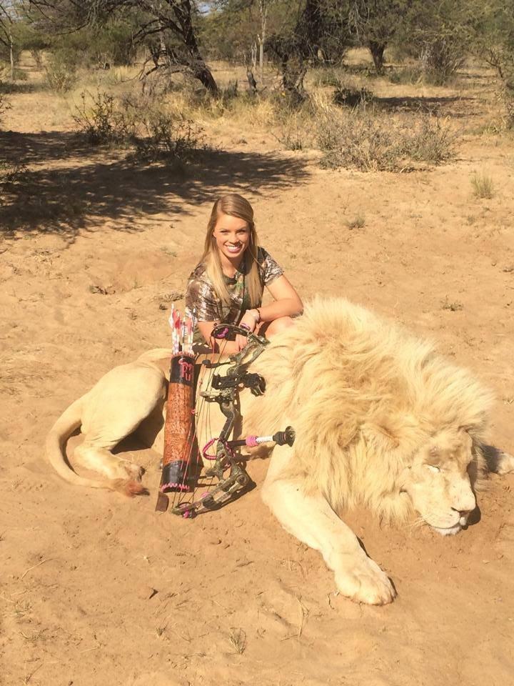 Texas Tech cheerleader Kendall Jones with her lion in Africa
