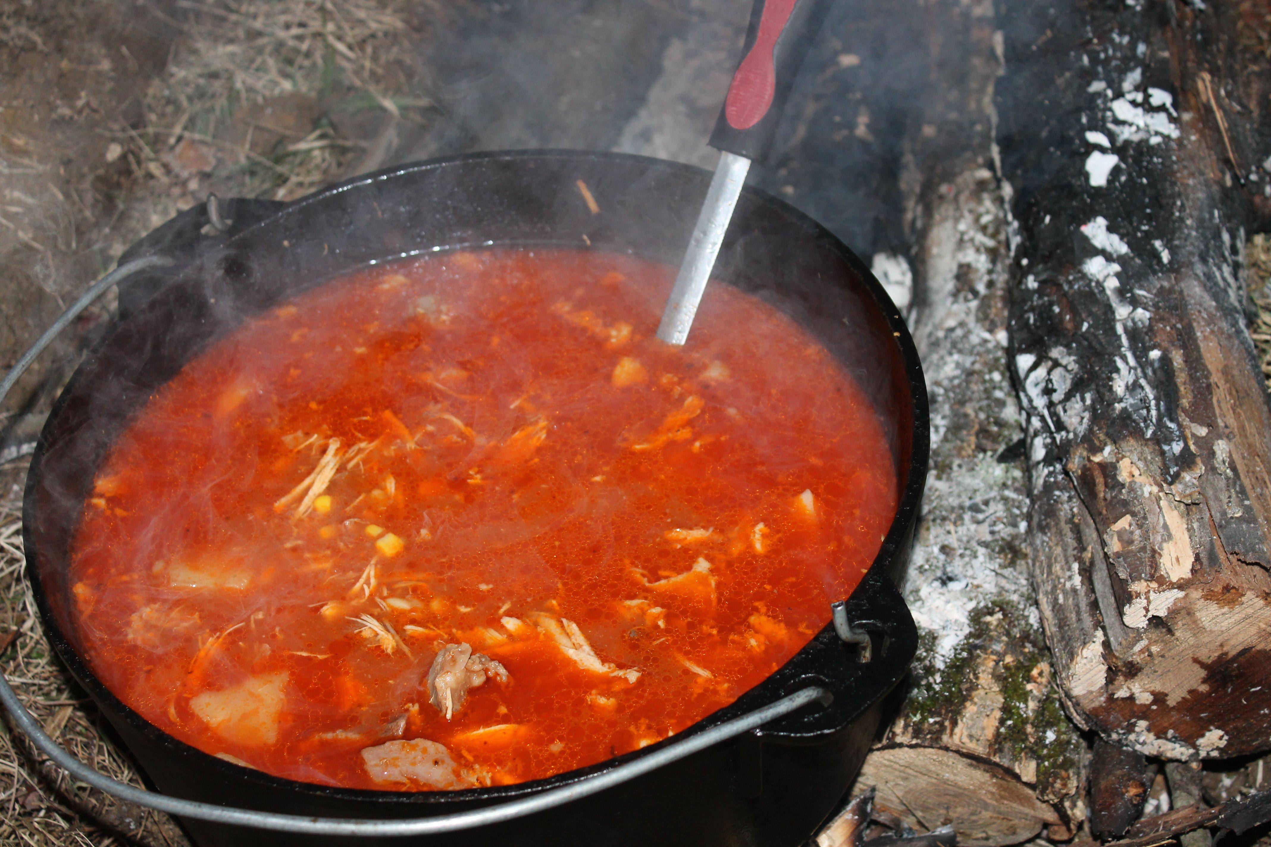 A pot of Kentucky Burgoo tastes best when it has simmered over a campfire.