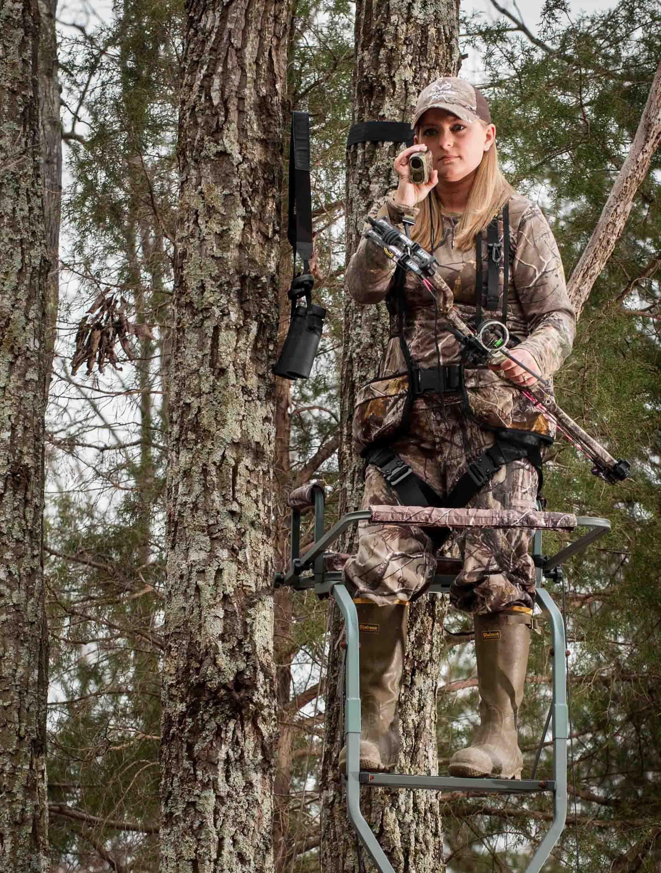 bow hunter in tree stand