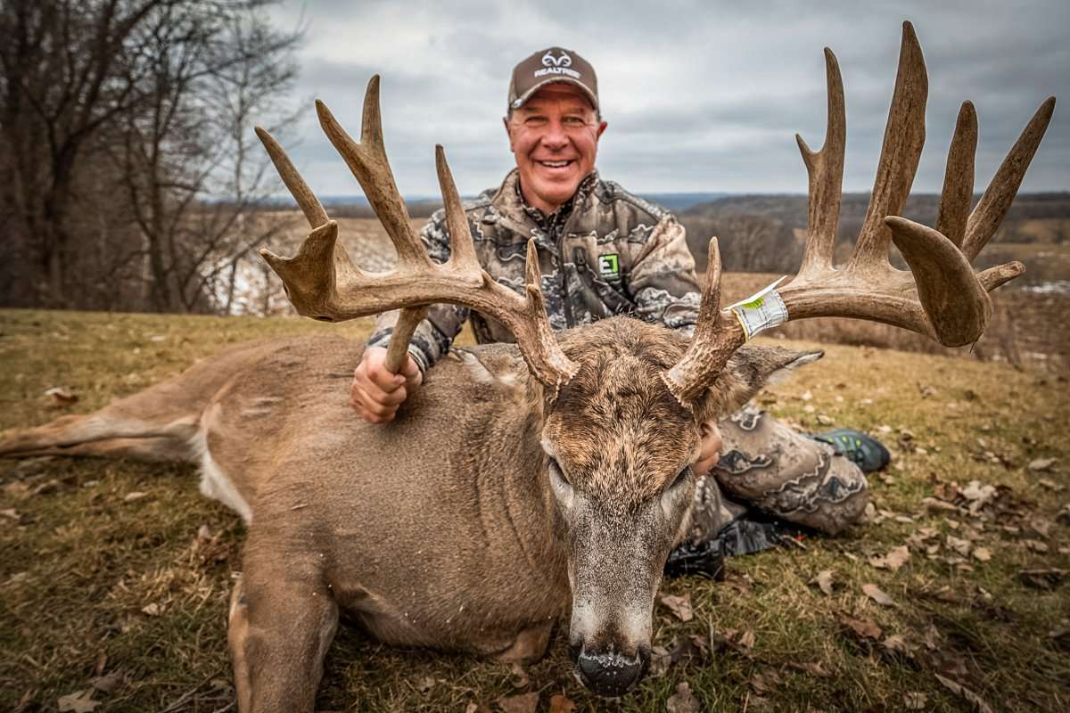 Mark Heck of The Given Right shows off his 198-inch, drop-tine monster. He tagged the buck in Iowa. (The Given Right photo) Mark Heck of The Given Right shows off his 198-inch, drop-tine monster. He tagged the buck in Iowa. (The Given Right photo)