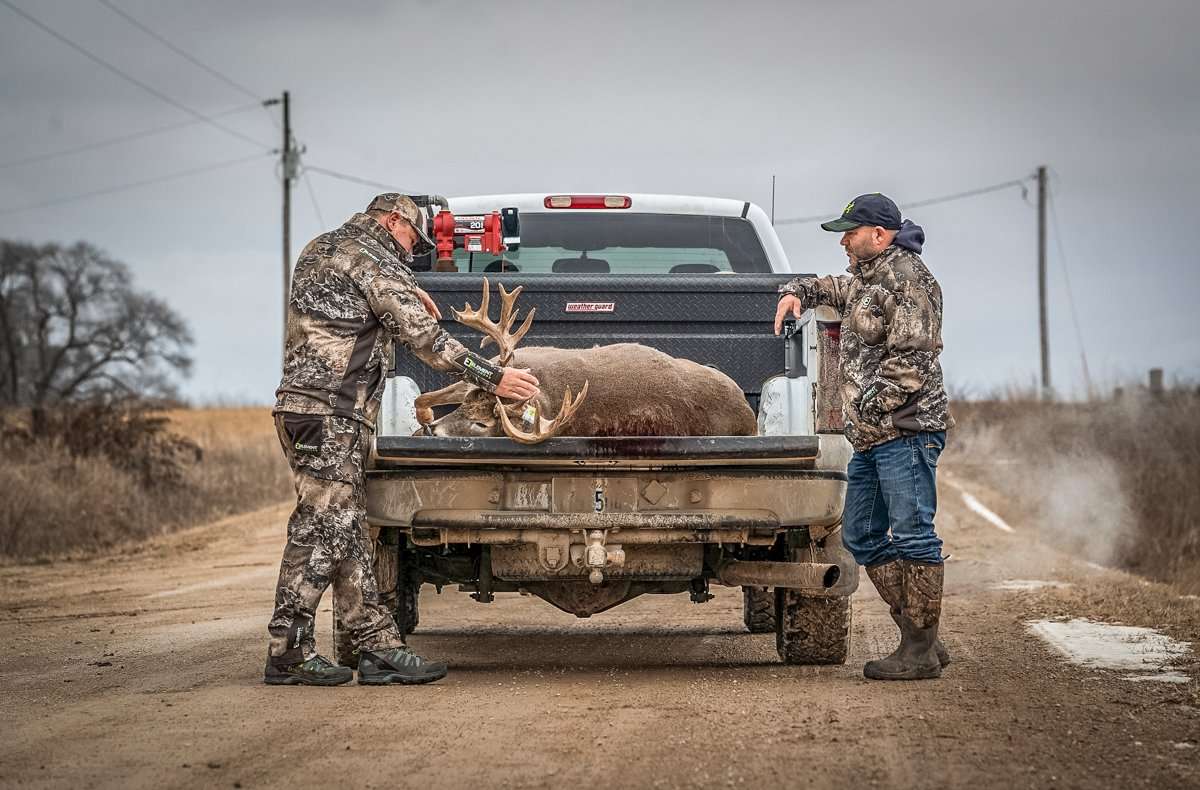 The Given Right's co-hosts, Mark Heck and Kenneth Lancaster, admire this incredible buck. (The Given Right photo)