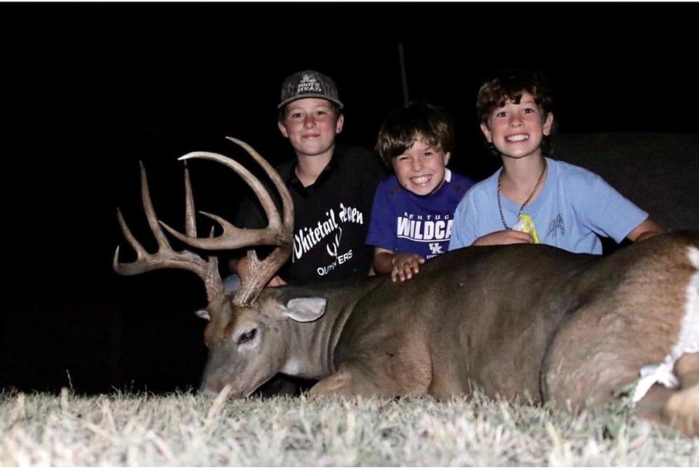 The McCauley brothers are all smiles behind Westin's (left) buck, which put the finishing touches on a great Kansas youth season. Image courtesy of Tevis McCauley/Whitetail Heaven Outfitters