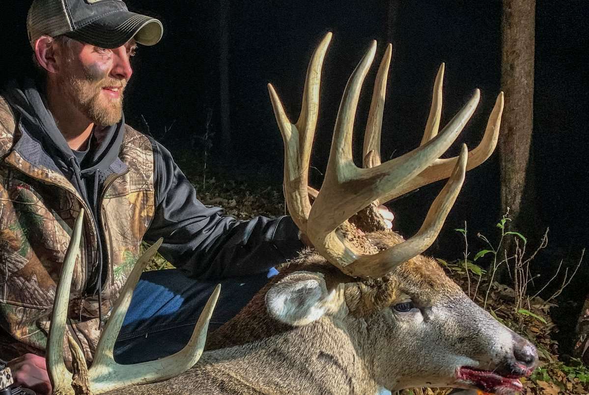 Bryton Meyer admires his giant Iowa buck. (Bryton Meyer photo) Bryton Meyer admires his giant Iowa buck. (Bryton Meyer photo)