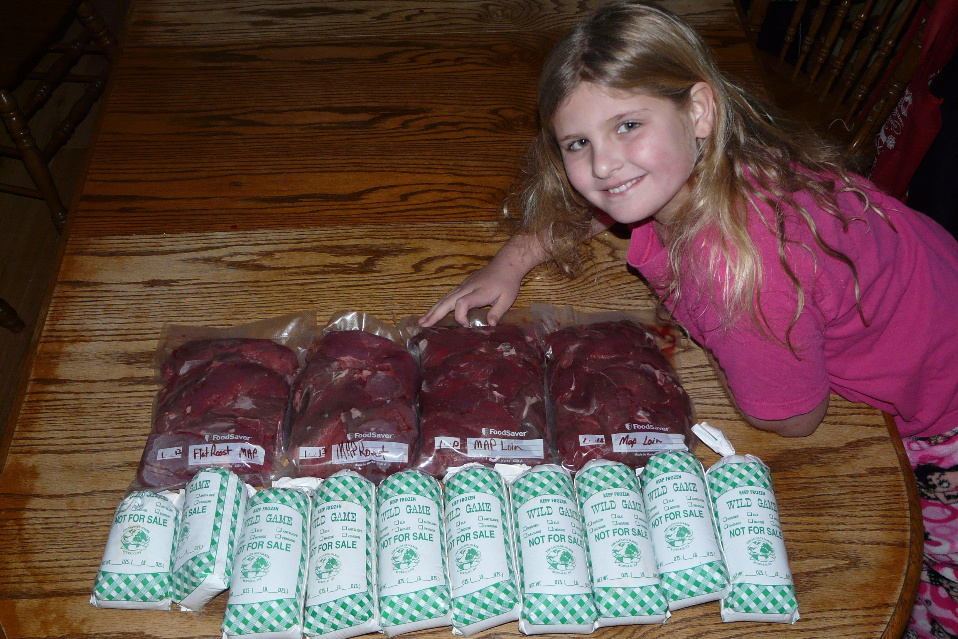 Michaela proudly displays some of the packaged meat from her first deer a few years ago. You work hard to put up a premium product, don't ignore it once it goes into the freezer.