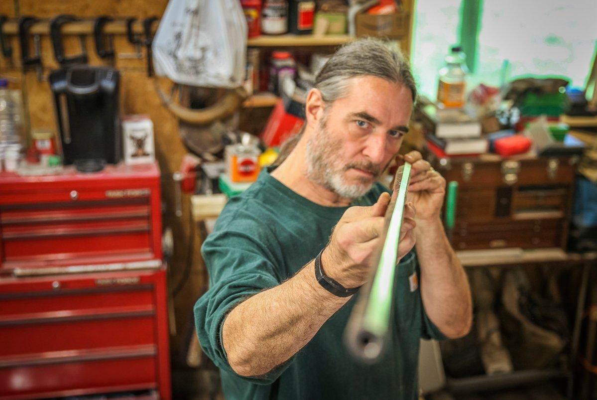 Mike Miller studies a barrel to see if it makes the cut. Image courtesy of Mike Miller