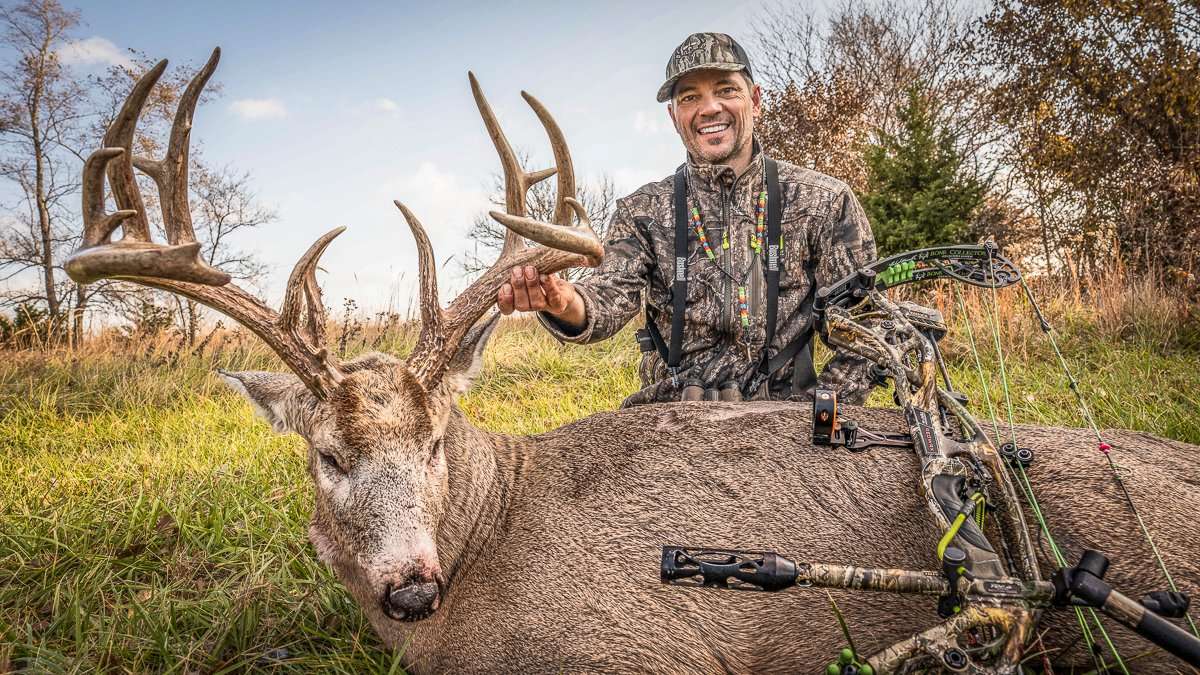 Nick Mundt proudly displays his 209 7/8-inch buck. (Bone Collector photo)