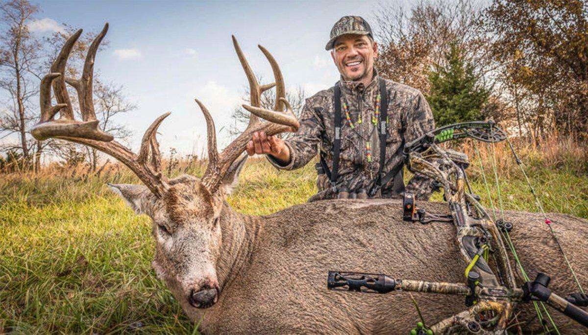 Bone Collector's Nick Mundt, who used to be a hunting guide, poses with a 200-plus-inch buck. Image by Bone Collector
