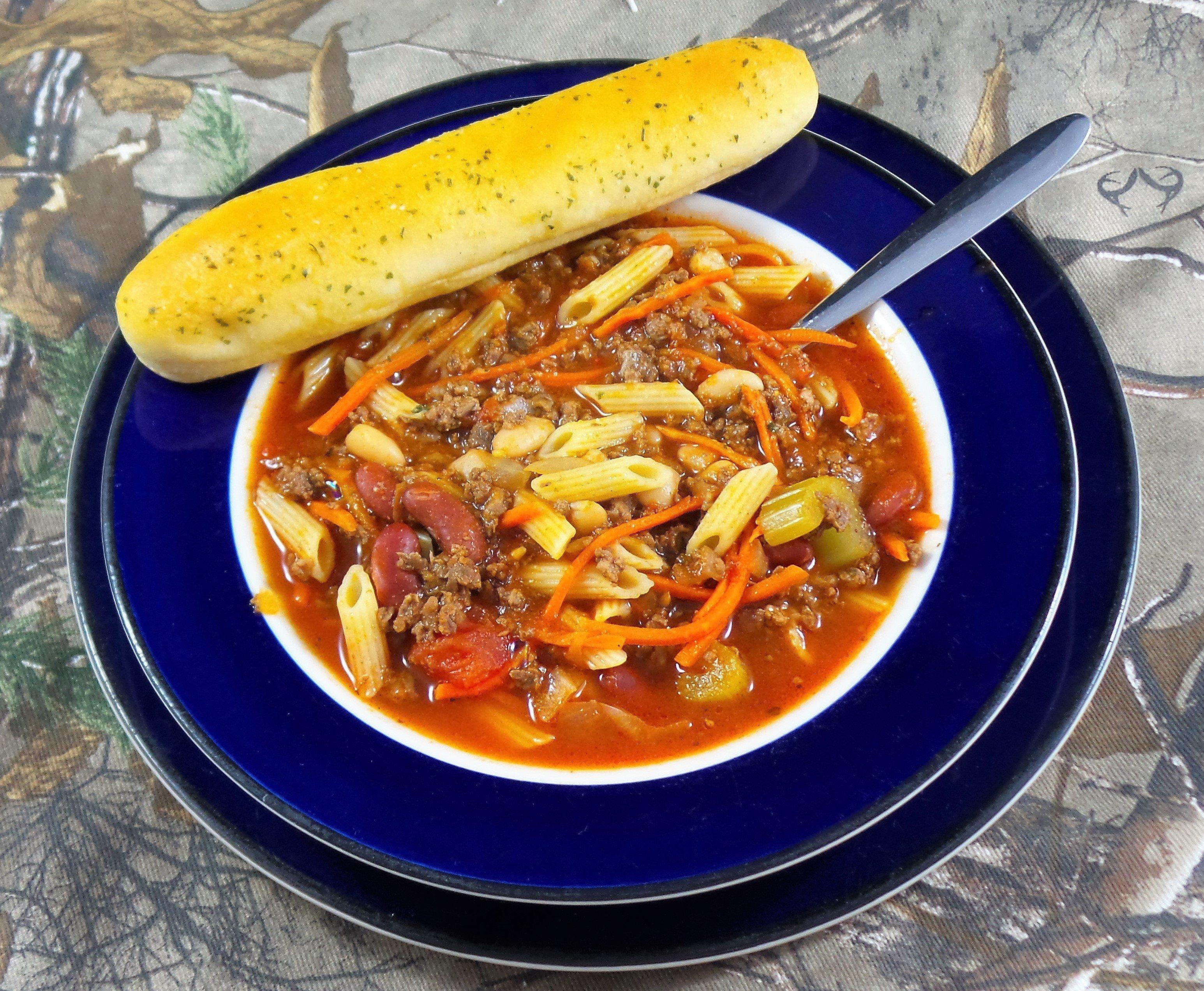 The addition of ground venison to this classic vegetable and bean soup turns it into a meal.