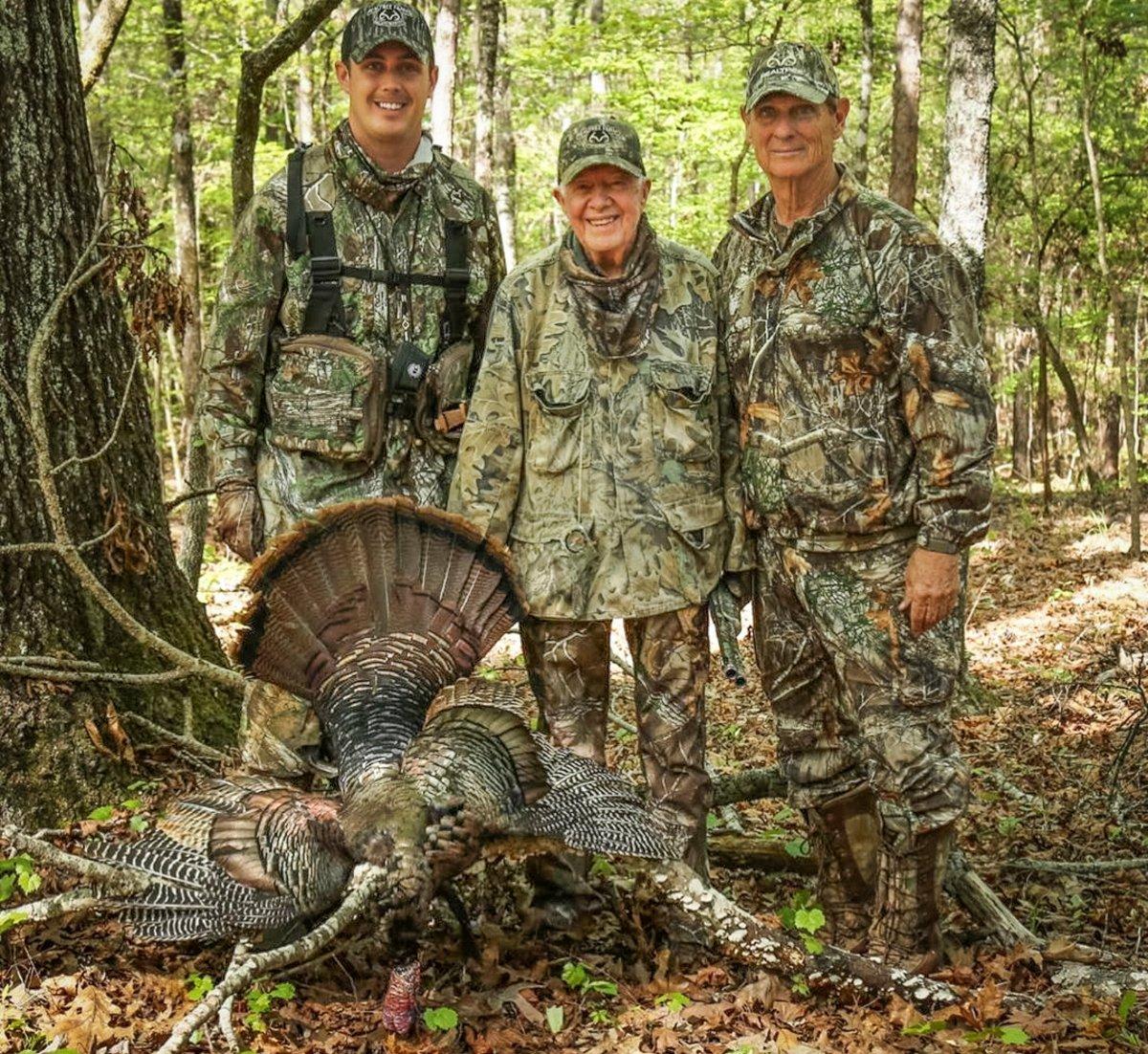 Former President Jimmy Carter shot his biggest turkey ever in 2017 with Bill and Tyler Jordan at Realtree Farms.
