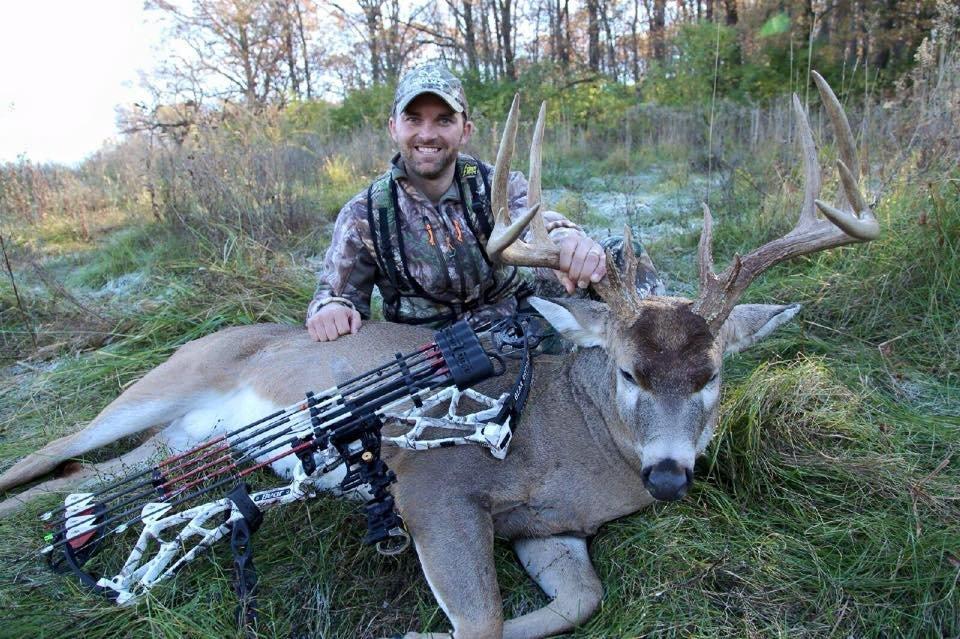 Priest poses with a big Missouri buck he tagged after finding a good stand location on onX. (Photo courtesy of Slade Priest)