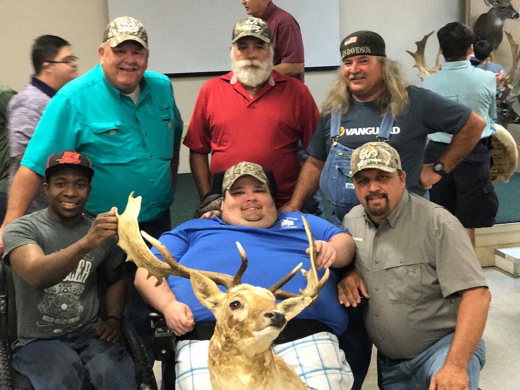 Billy Daw and company pose with his fallow buck. (Billy Daw photo)