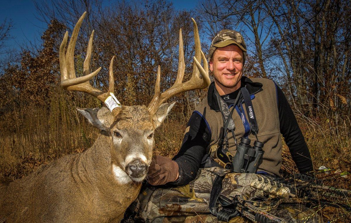 Bill Winke poses with a great buck he arrowed in 2009, right after he started Midwest Whitetail. (Midwest Whitetail photo)