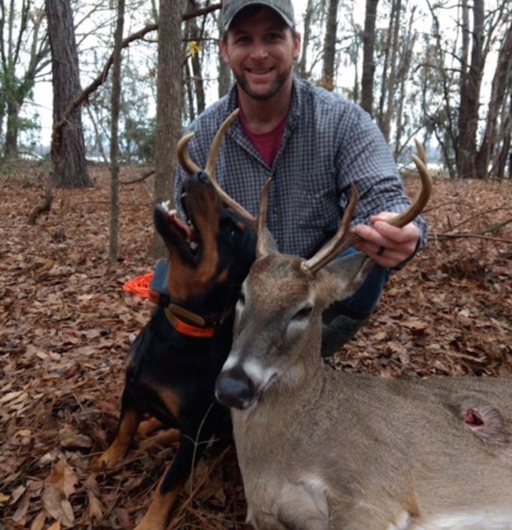 A happy dog and hunter.