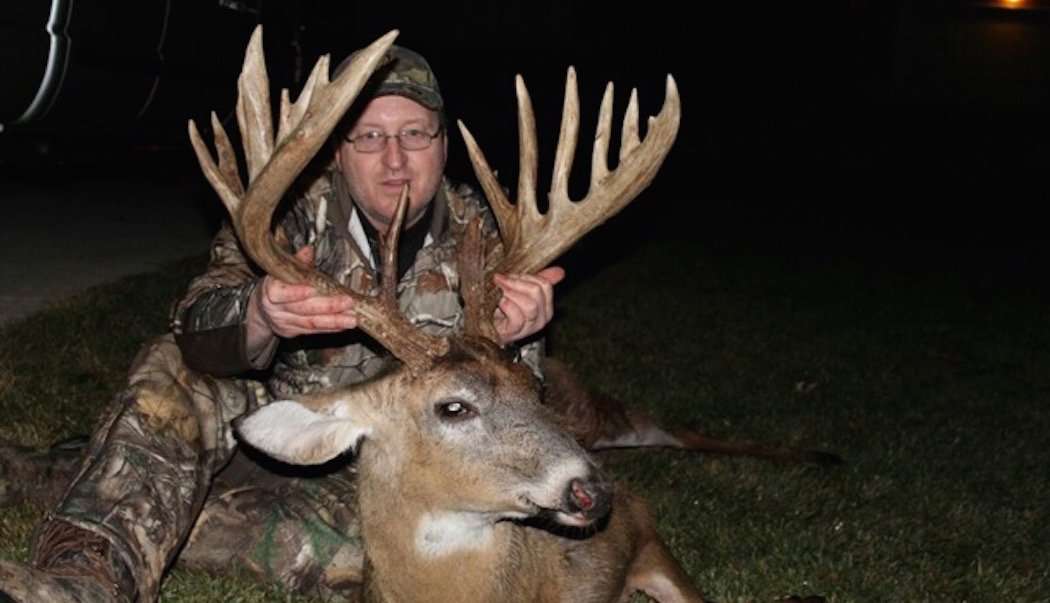 David McDuffie holds up that giant Ohio buck's rack. (David McDuffie photo)