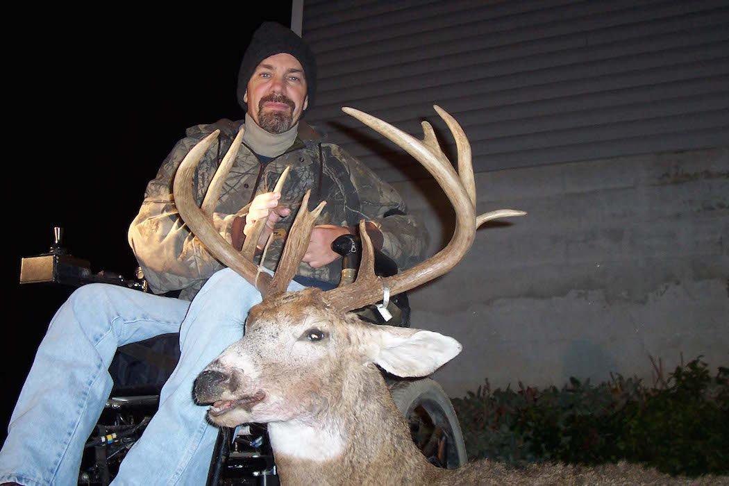 George shows off one of his many big deer. (Photo courtesy of George Bolender)