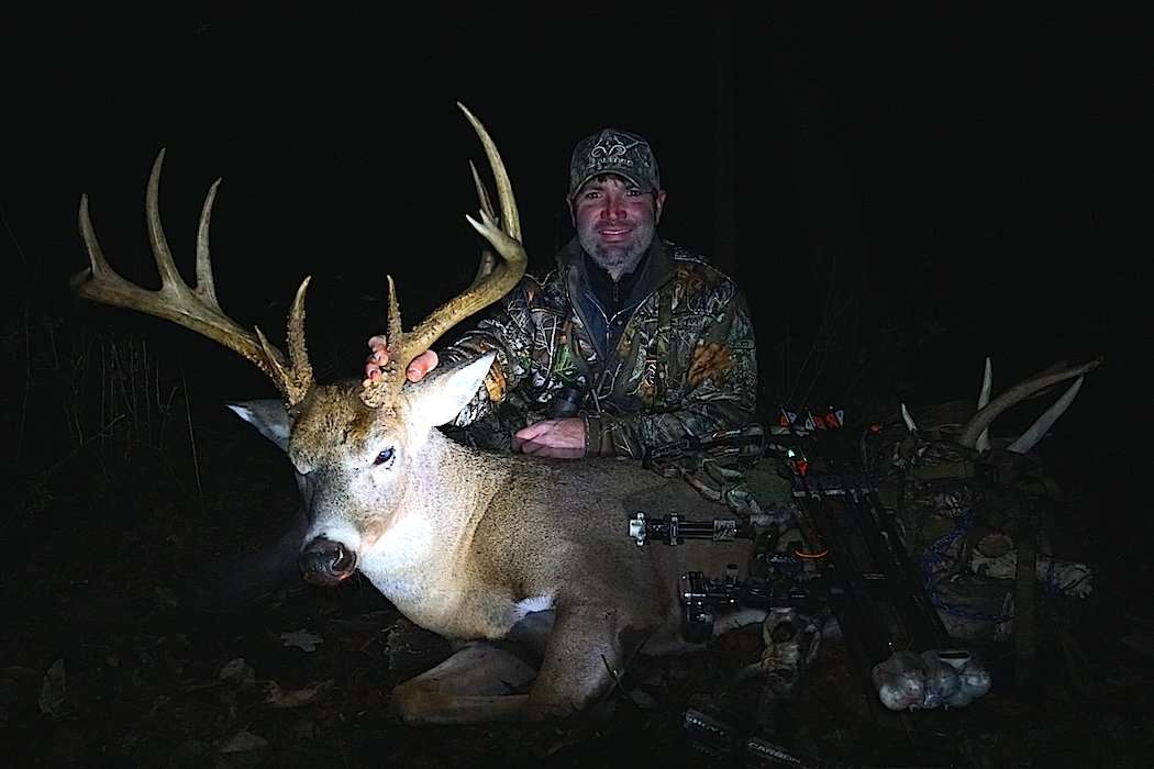 Phillip Culpepper sits behind his giant 2018 Iowa buck. (Drake Lamb photo)
