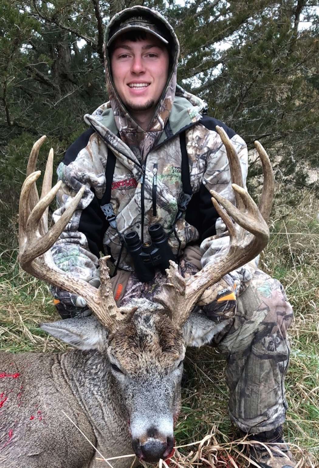 Derek Leinen of Iowa stalked this world-class buck in a cornfield as it held tight with a doe. (Photo courtesy of Derek Leinen)