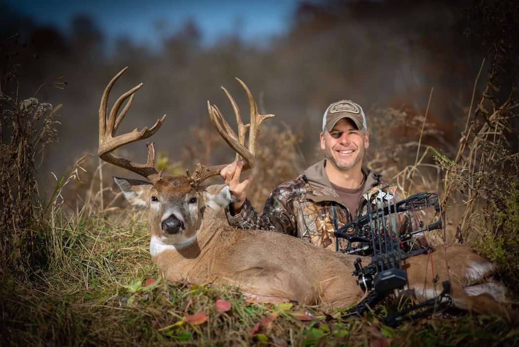 Bowhunter Jason Eiring arrowed this Minnesota behemoth, which grosses 212 2/8 inches, on October 30 while hunting with Mark Schuhter of Schuhter's Outpost. (Photo courtesy of Shane Indrebo)