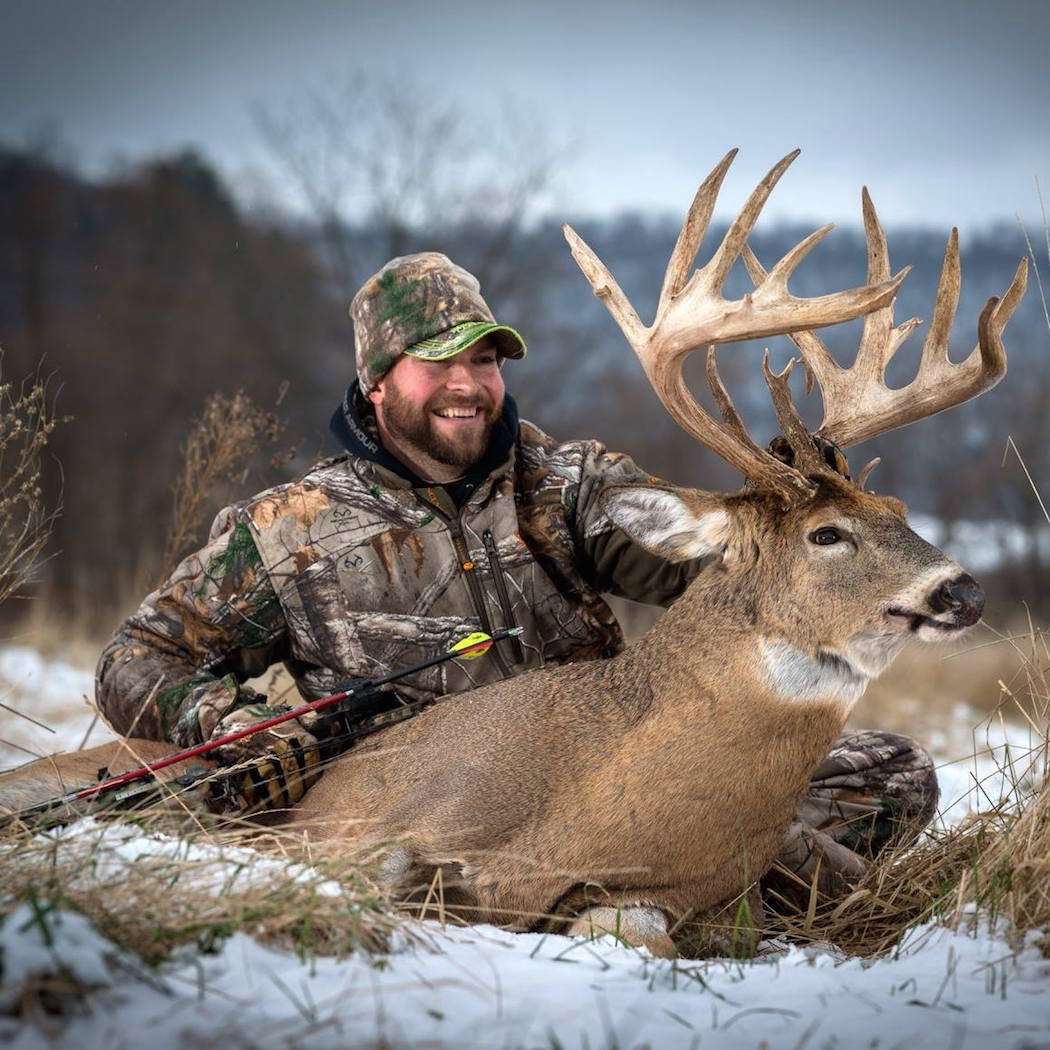 Bowhunter Joshua Gawrysiak is all smiles behind his world-class Wisconsin whitetail. (Photo courtesy of Joshua Gawrysiak)