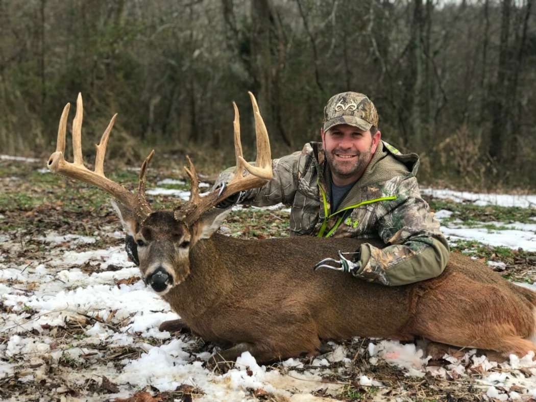 Jason Koger proudly shows off his 185-inch Kentucky monarch. (Photo courtesy of Jason Koger)