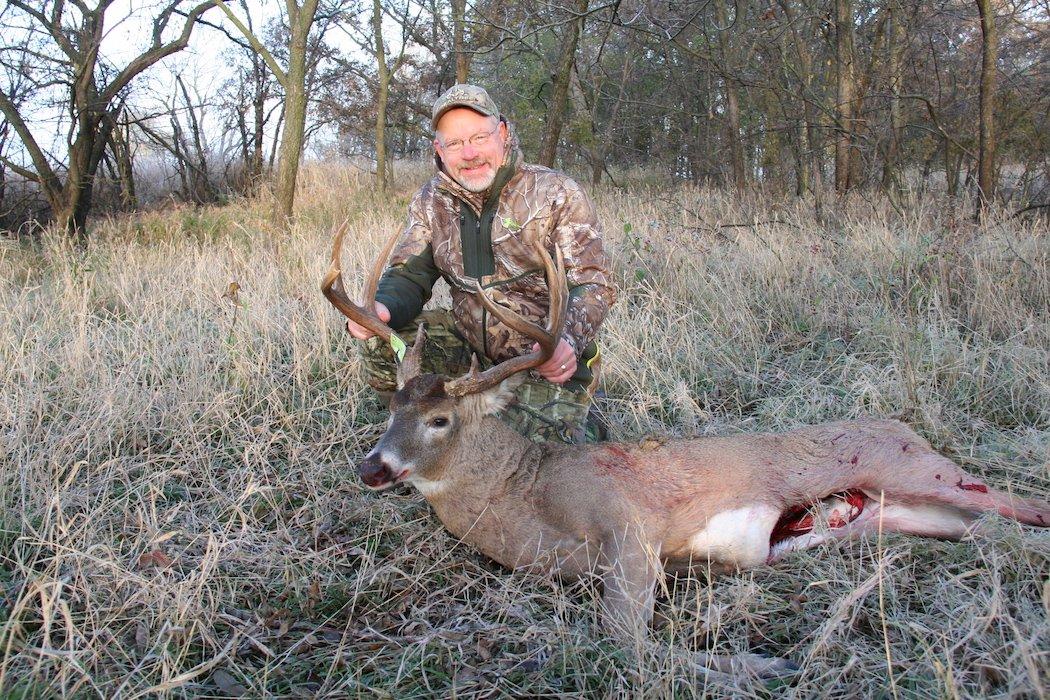 Bernie poses with one of his DIY bucks. (Photo courtesy of Bernie Barringer)