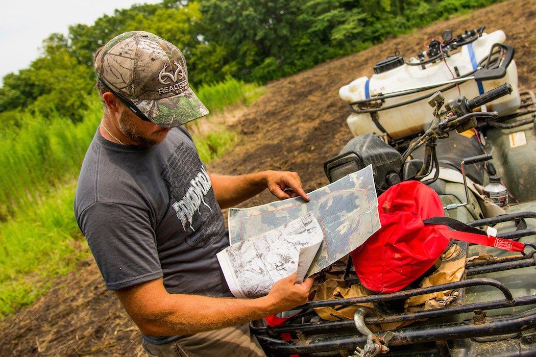 Studying a printed map helps you learn a property's features in a way that small digital copies can't. (Realtree photo)