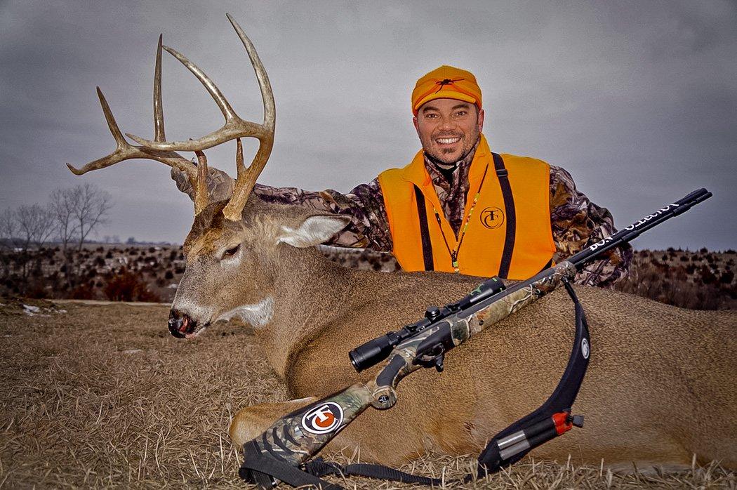 Bone Collector's Nick Mundt poses with a great late-season Iowa buck. (Bone Collector photo)
