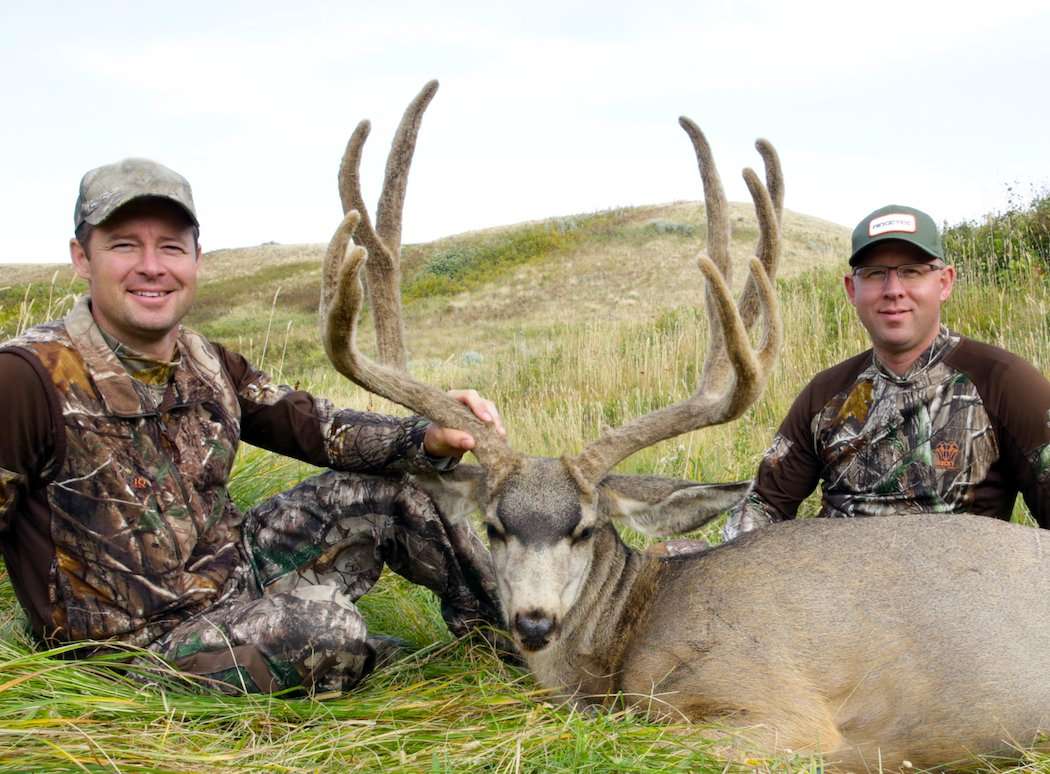 Paul Beasley and friend Chase Wendorff pose with his 181 2/8-inch buck. (Canada in the Rough photo)