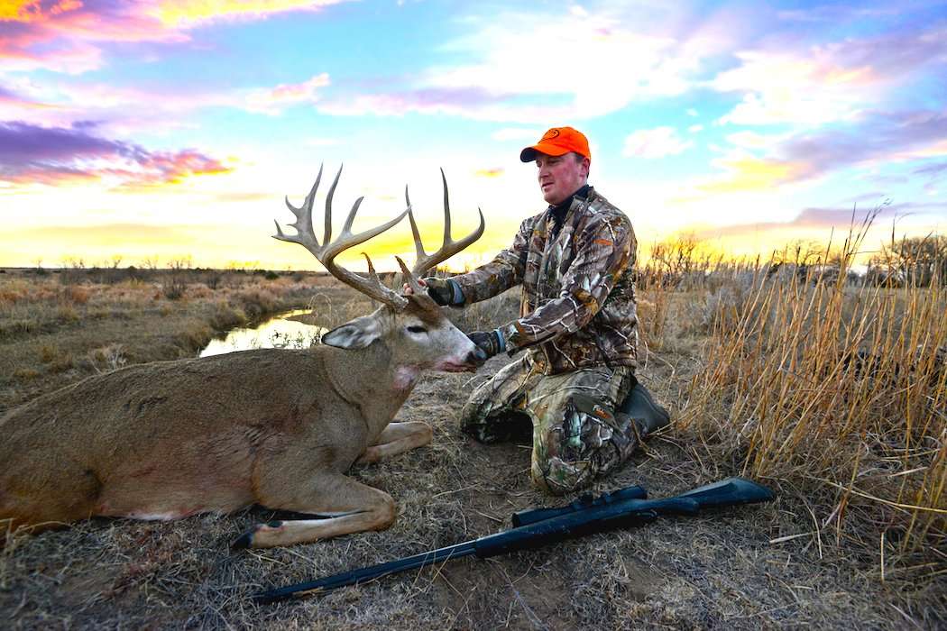 Ben Richardson poses with his giant Kansas buck. (Ben Richardson photo) Ben Richardson poses with his giant Kansas buck. (Ben Richardson photo)