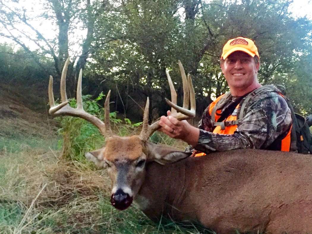 Wesley posing with his big Kansas buck. (Wesley McConnell photo)