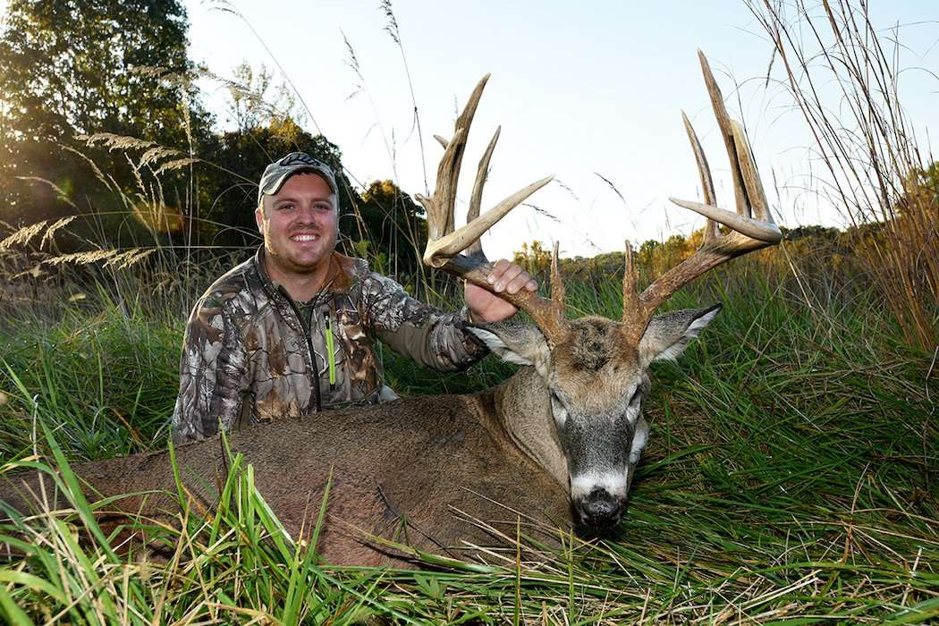 Seller poses with his giant buck. (Nick Skinner photo)