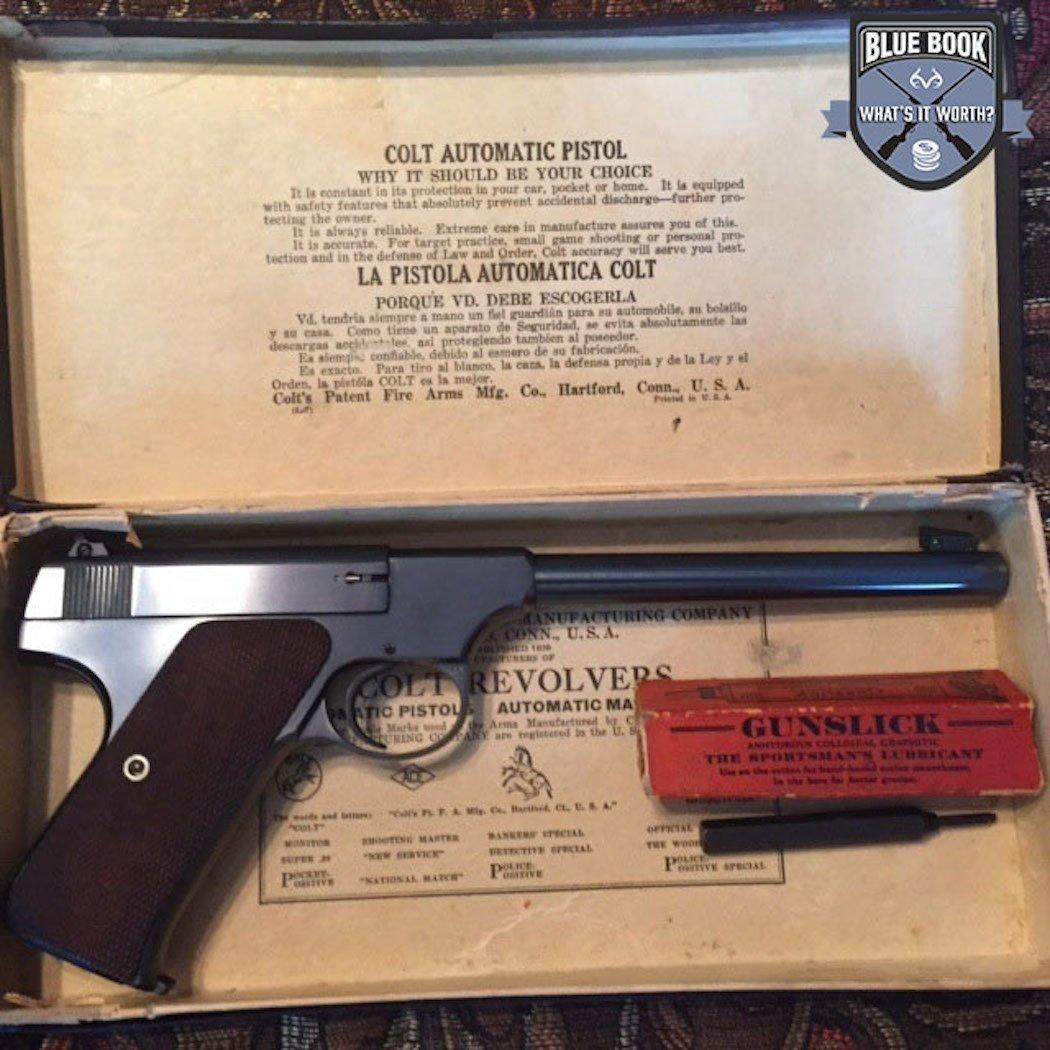 The Colt Woodsman in its original box