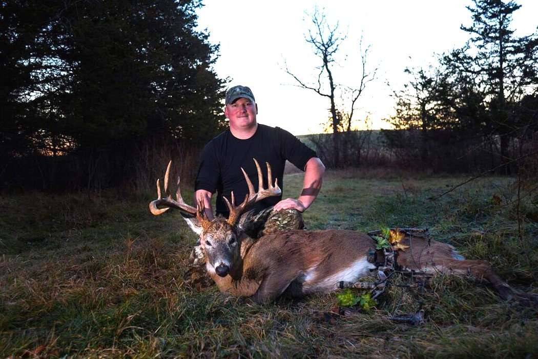 Jon Petryk is all smiles behind his Bay State bruiser. The world-class buck has 15 score-able points. 