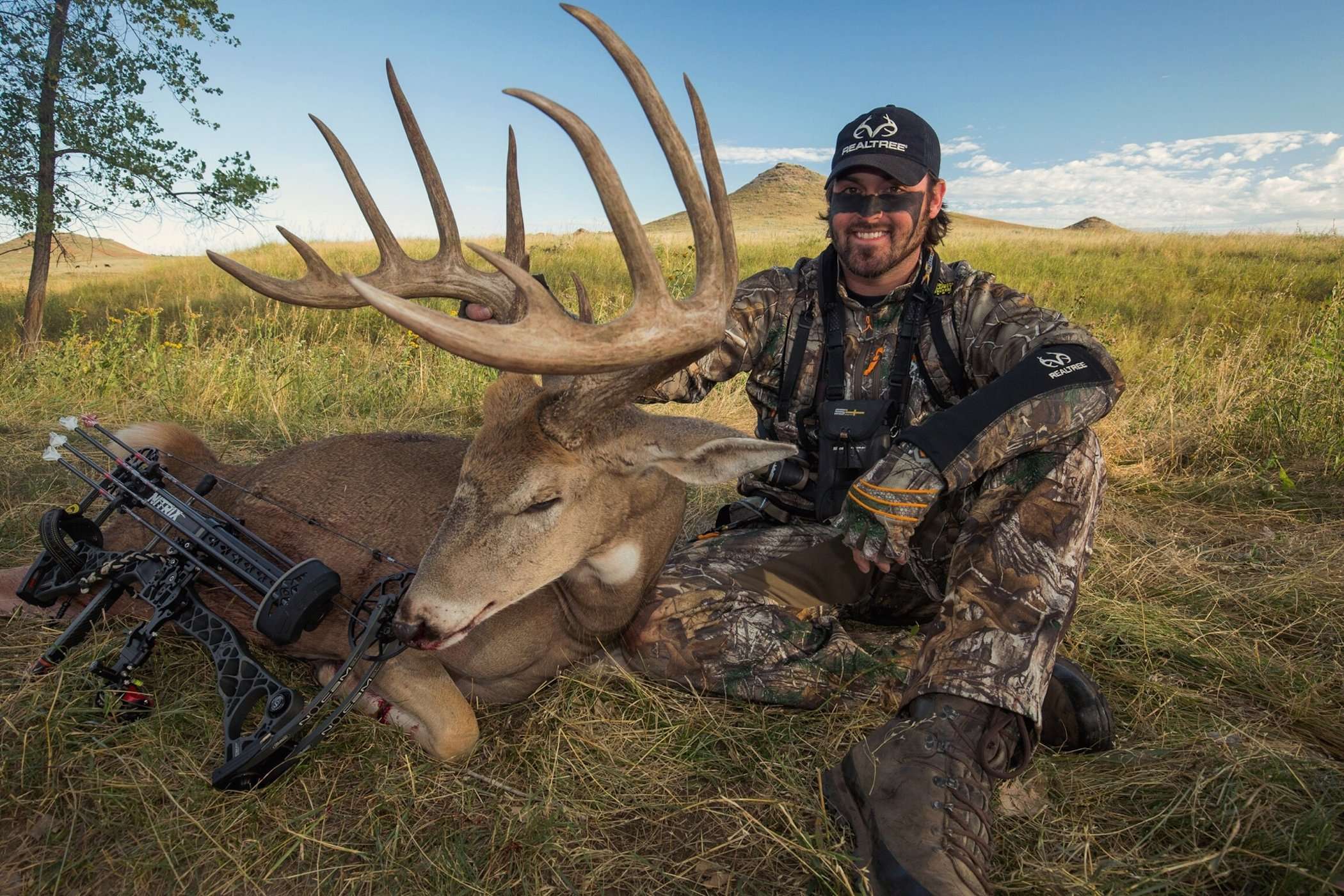 Nate Hosie poses with his biggest buck ever.