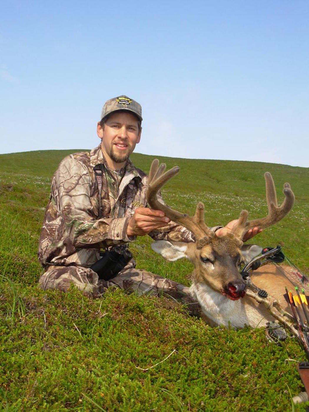 Joe Bell poses with a Sitka black-tailed deer. (Joe Bell photo)
