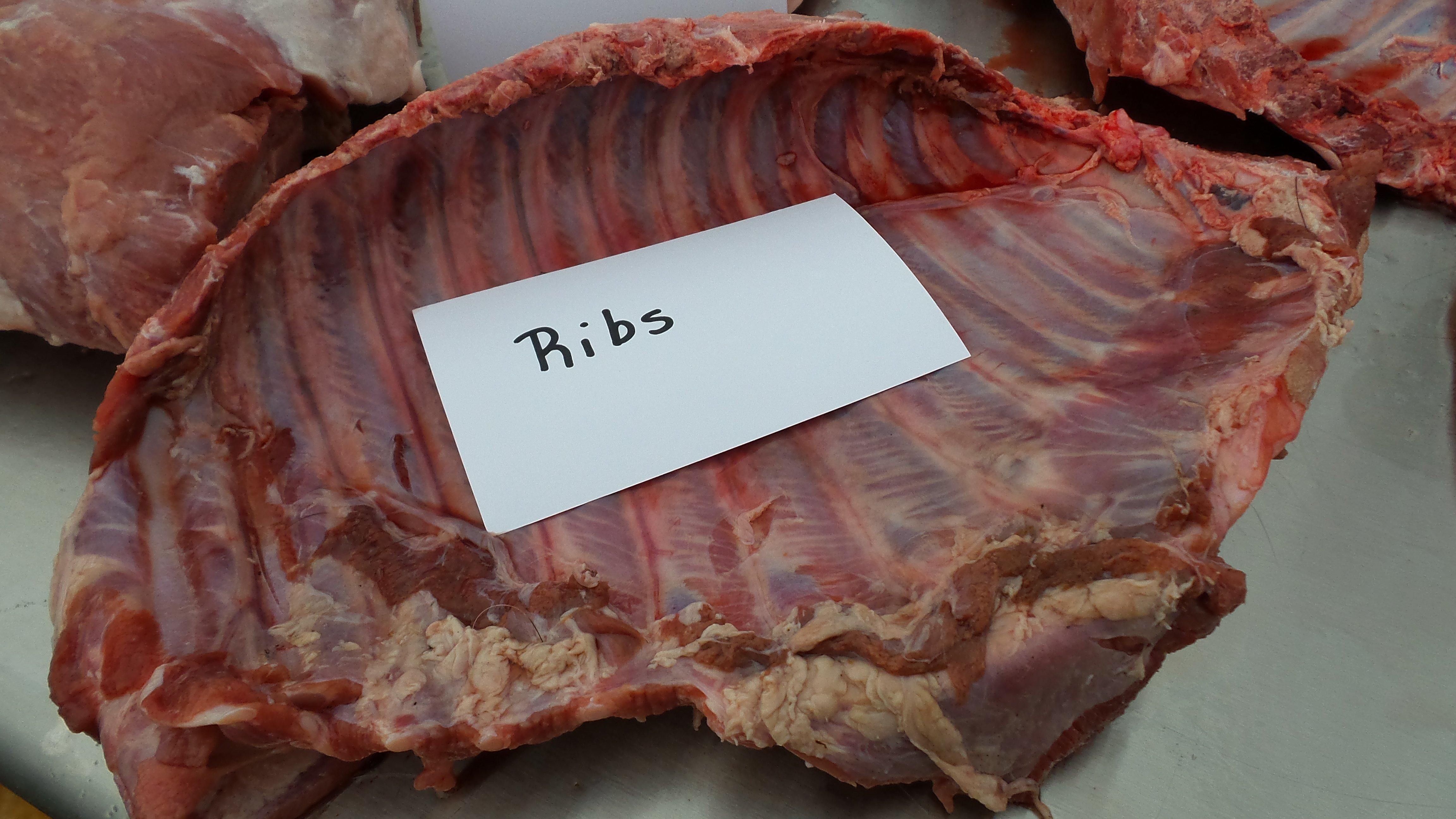 While small, wild pig ribs on the grill or smoker make excellent game day snacks.