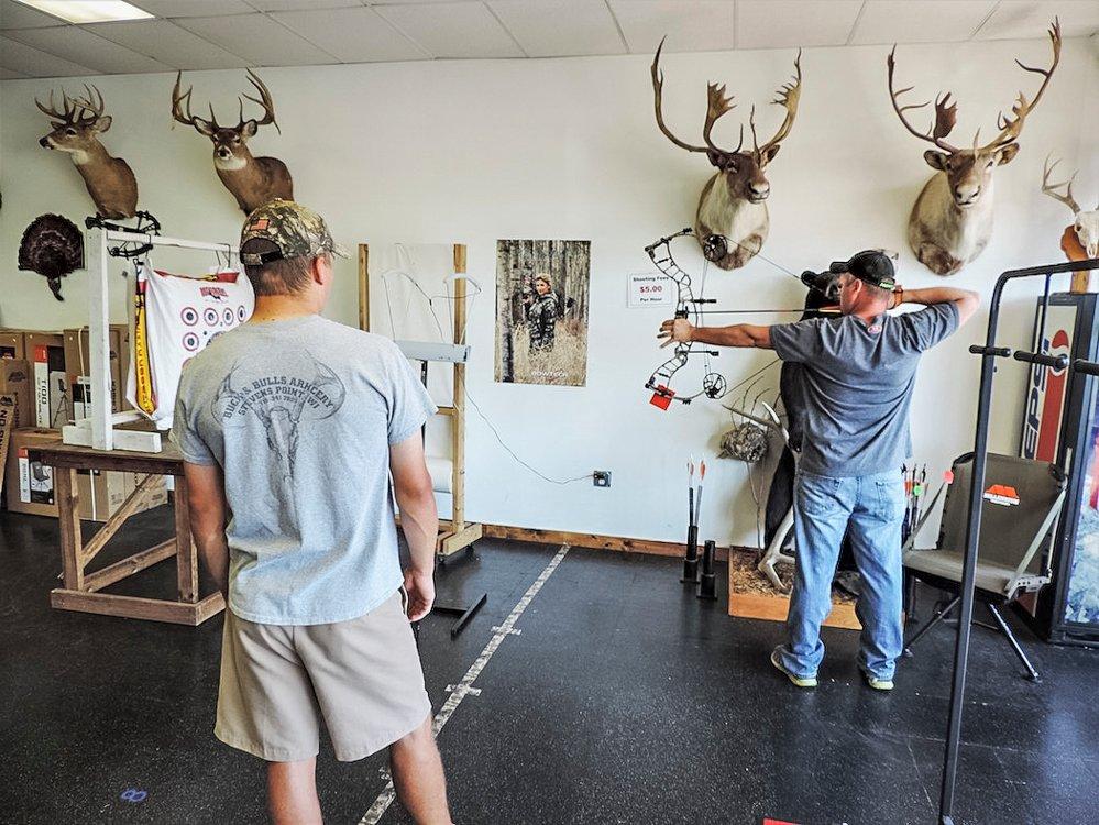 Before you purchase a new bow, the benefit of going the pro-shop route is test-firing several bows so you can feel the differences. (Darron McDougal photo)