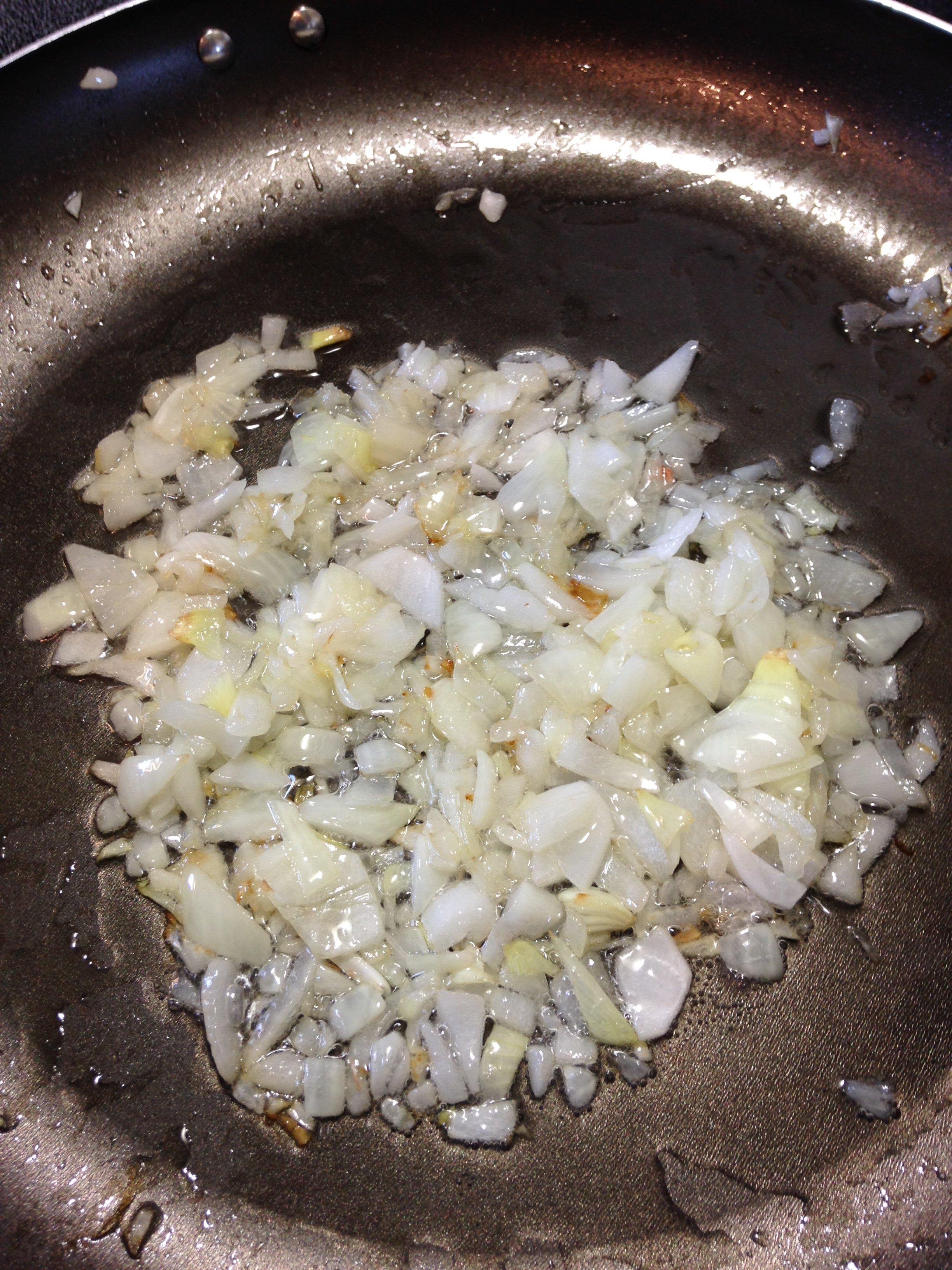 Saute onions and garlic in a tablespoon of oil.
