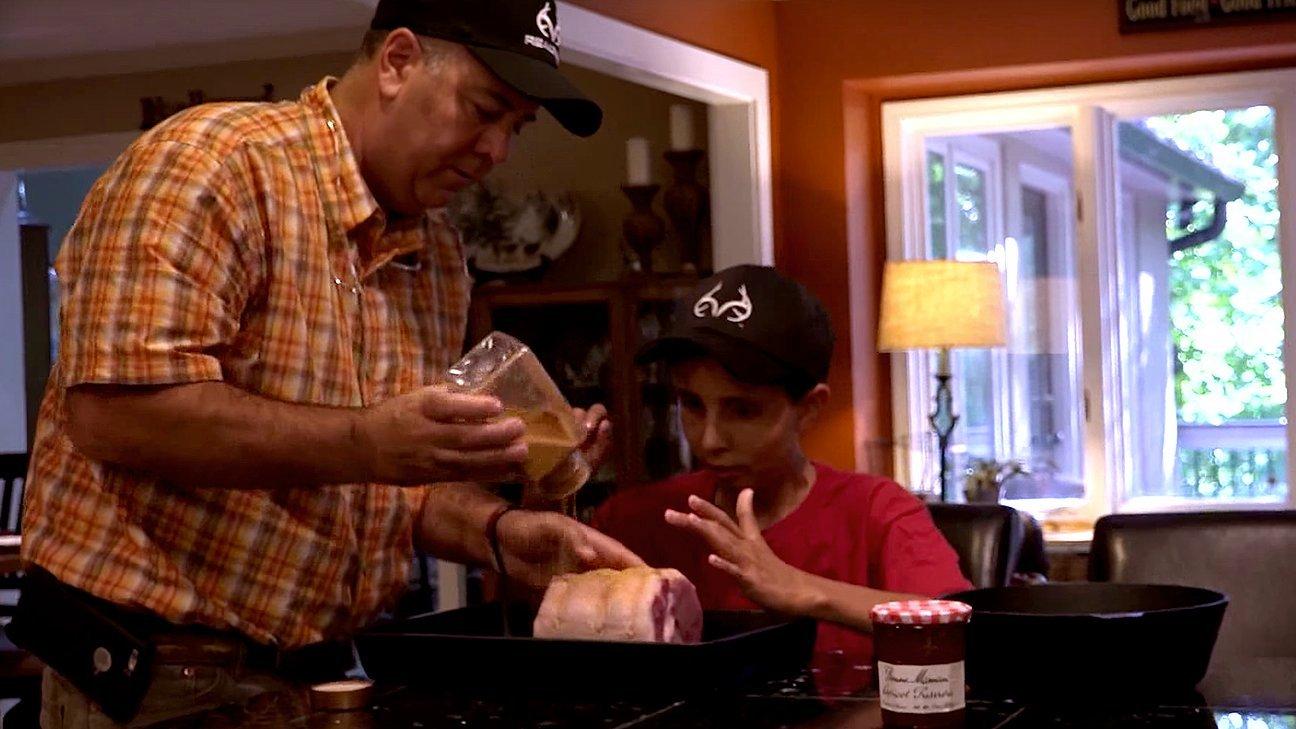 Chip and his dad show how they season the pork tenderloin before grilling.